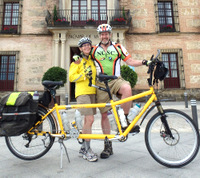 Dennis and Terry Struck pose with the Bee (a da Vinci Tandem) in front of the 'Alcazar de la Reina', Carmona, Andalucia, Spain.